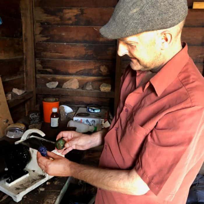 Neil Roper polishing some stones