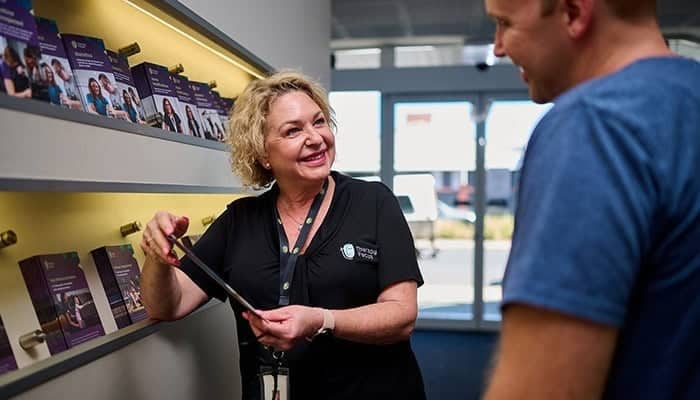 Apply for services Customer experience member talking with customer