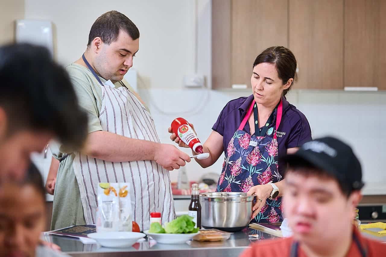 Therapist and customer in a cooking class